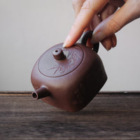 Tian Di Fang Yuan 天地方圆 - Bamboo carved Yixing teapot, Zini purple clay