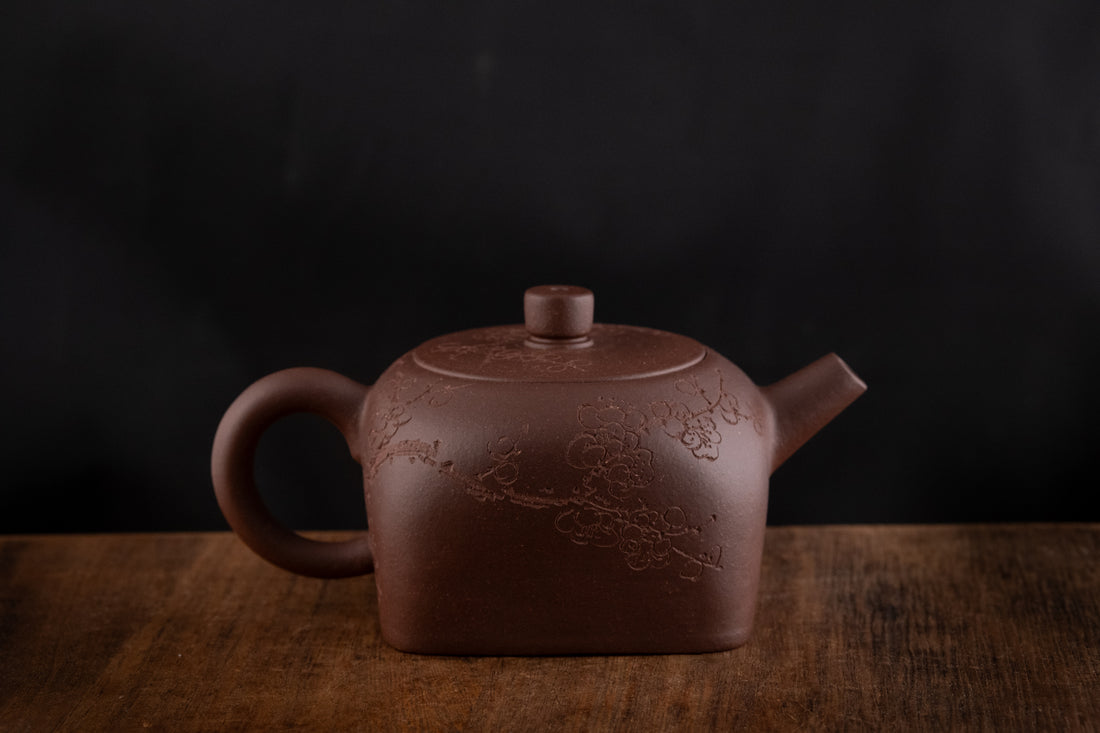 Tian Di Fang Yuan 天地方圆 - Flower carved Yixing teapot, Zini purple clay