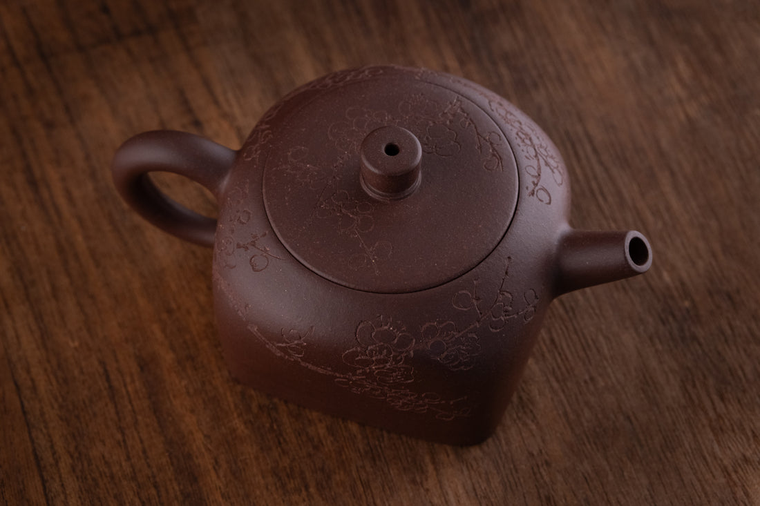 Tian Di Fang Yuan 天地方圆 - Flower carved Yixing teapot, Zini purple clay