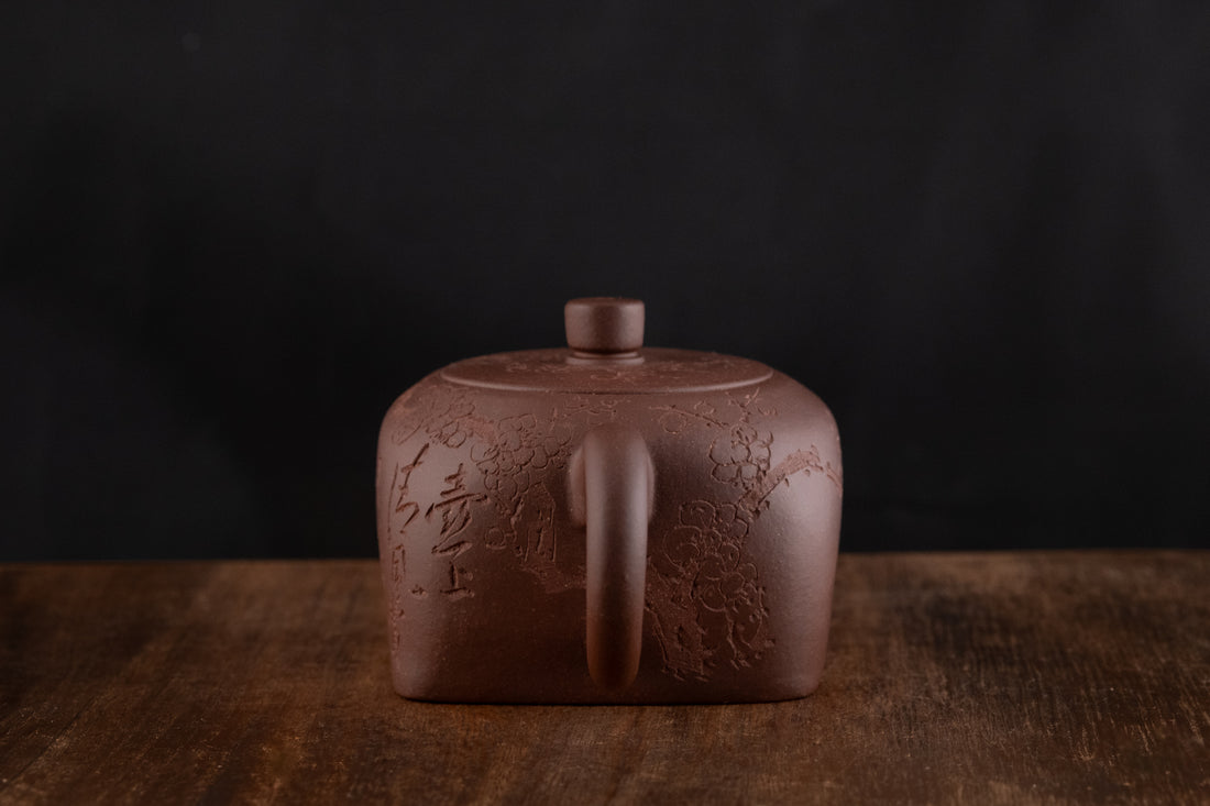 Tian Di Fang Yuan 天地方圆 - Flower carved Yixing teapot, Zini purple clay
