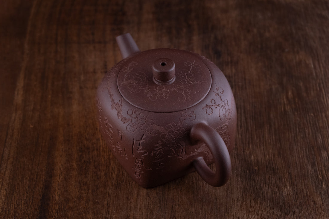 Tian Di Fang Yuan 天地方圆 - Flower carved Yixing teapot, Zini purple clay