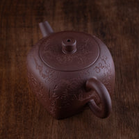 Tian Di Fang Yuan 天地方圆 - Flower carved Yixing teapot, Zini purple clay