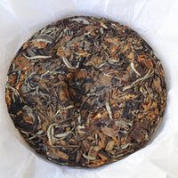 2025 Nannuo Yueguangbai white tea with Tea Flowers, Wild Forest stone-pressed Cake
