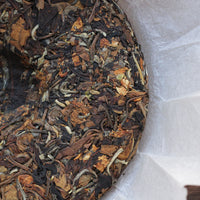 2025 Nannuo Yueguangbai white tea with Tea Flowers, Wild Forest stone-pressed Cake