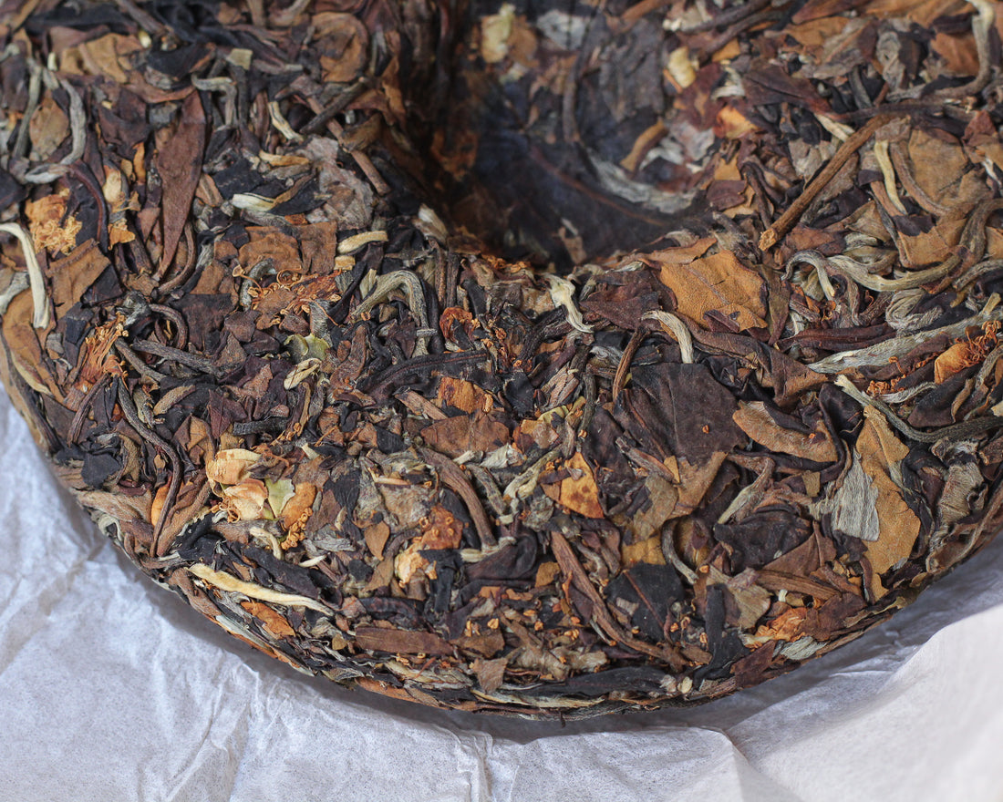 2025 Nannuo Yueguangbai white tea with Tea Flowers, Wild Forest stone-pressed Cake