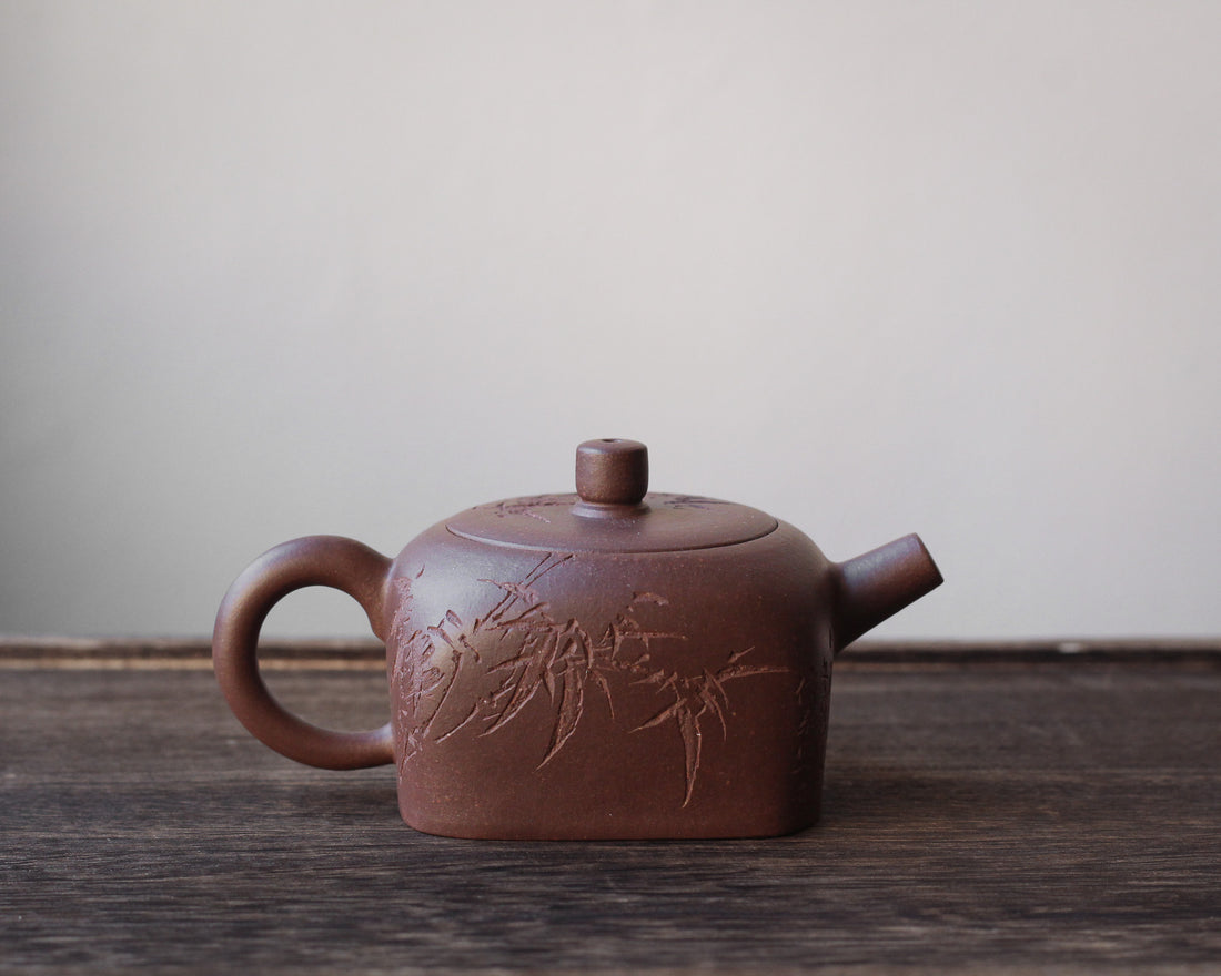 Tian Di Fang Yuan 天地方圆 - Bamboo carved Yixing teapot, Zini purple clay