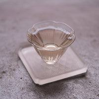 Anjibaicha Chinese green tea from Zhejiang, China, bright liquor in glass cup