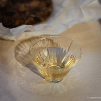 white tea presse cake yueguangbai moonlight from Yunnan, Nannuo, China, loose-leaf for gongfucha, brew detail in glass cup flower shape