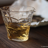 white tea presse cake yueguangbai moonlight from Yunnan, Nannuo, China, loose-leaf for gongfucha, brew detail in glass gongdaobei pitcher and server